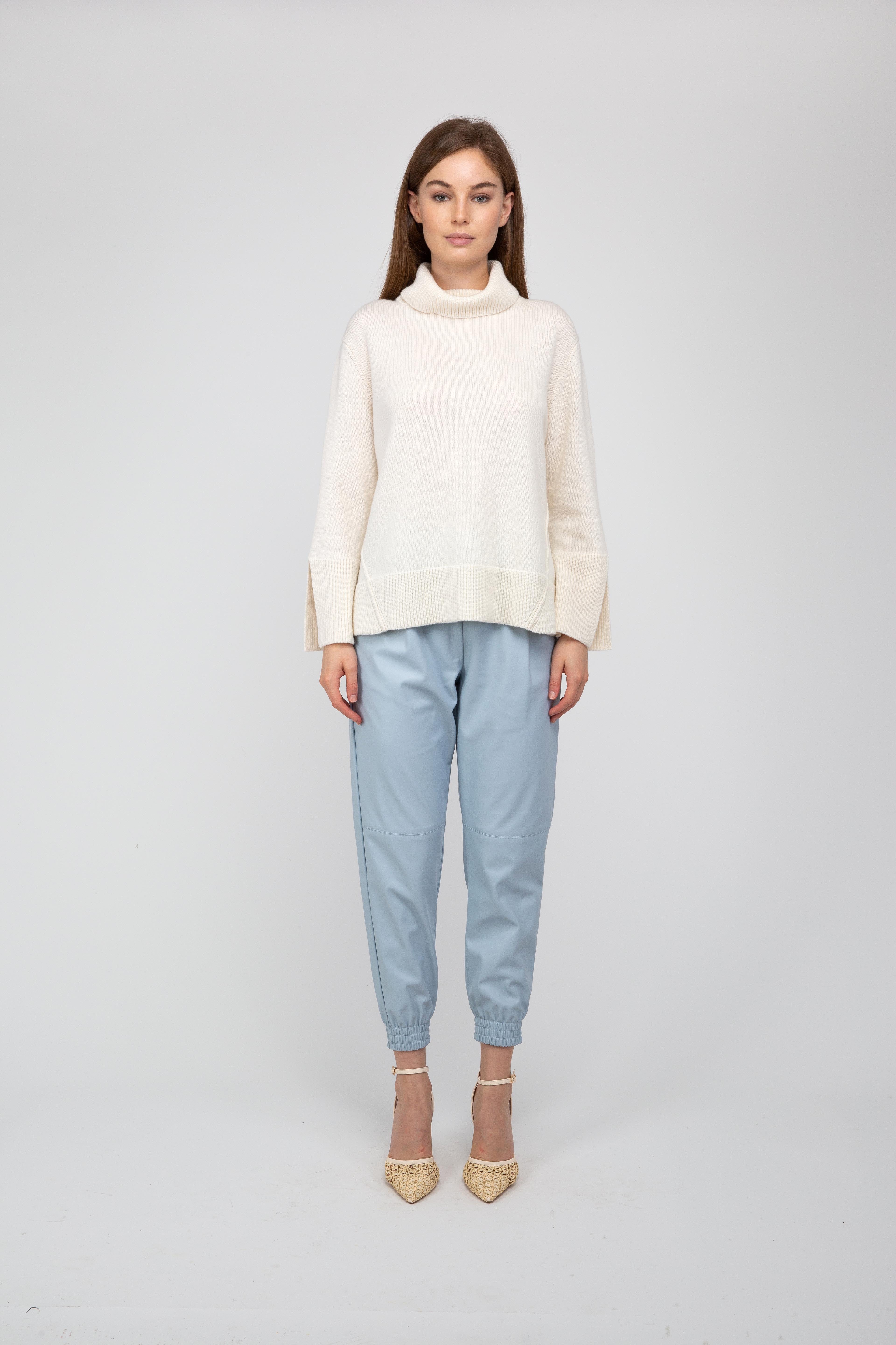 VAN KUKIL ROLL NECK SLIT CUFF